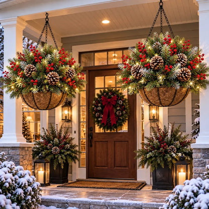 Pair of lit hanging baskets on a porch beside a wooden front door with a red-bow wreath 4