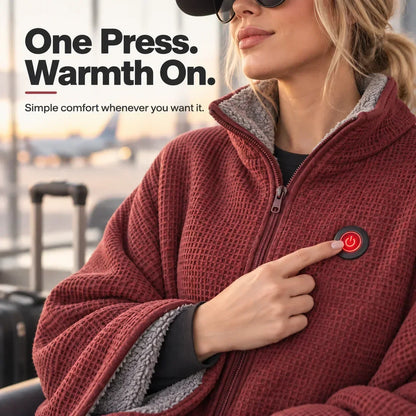 Close-up of a woman pressing the red power button on the chest of the red waffle-knit wrap 9