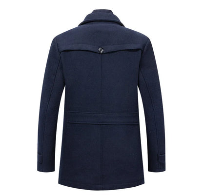 Back view of the navy overcoat, showing the buttoned yoke flap and the waist strap 9