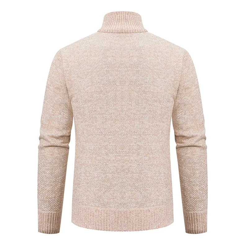 Back view of the beige knitted cardigan, showing the plain textured knit and ribbed stand collar 9