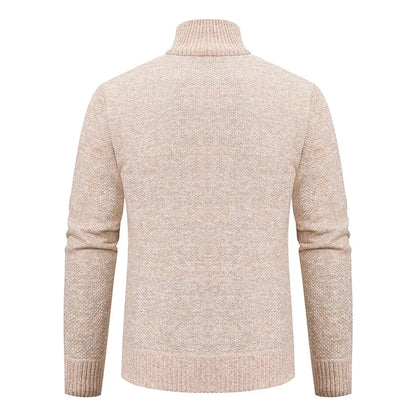 Back view of the beige knitted cardigan, showing the plain textured knit and ribbed stand collar 9
