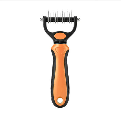 Front view of the orange and black rake on a white background, showing its straight teeth and rubberised handle. 14