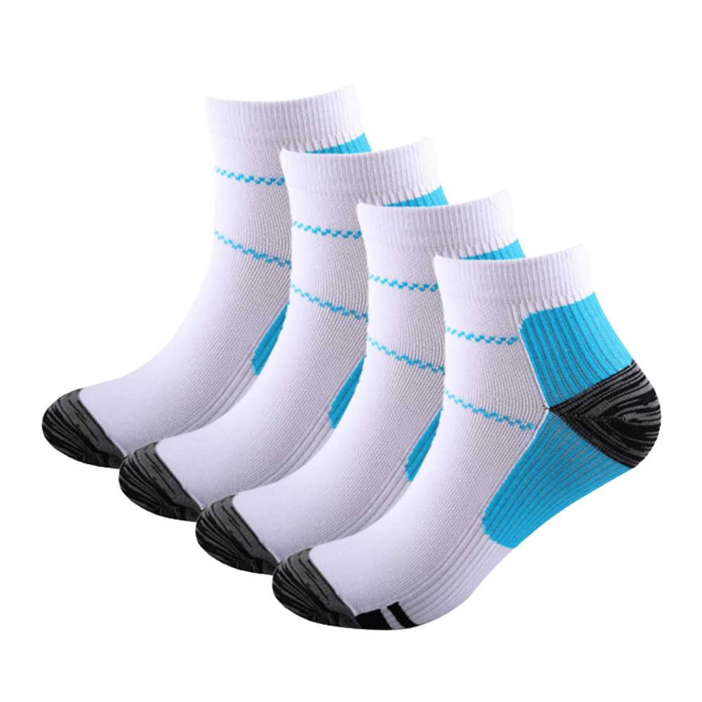 Four white ankle socks with blue arch panels and dark grey toes and heels, arranged in a staggered row. 6