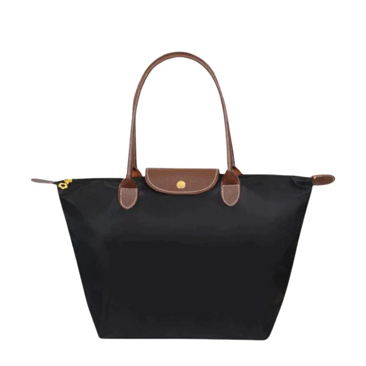 Schwarze Damenhandtasche mit braunen Ledergriffen, elegantes Design, vielseitig einsetzbar.