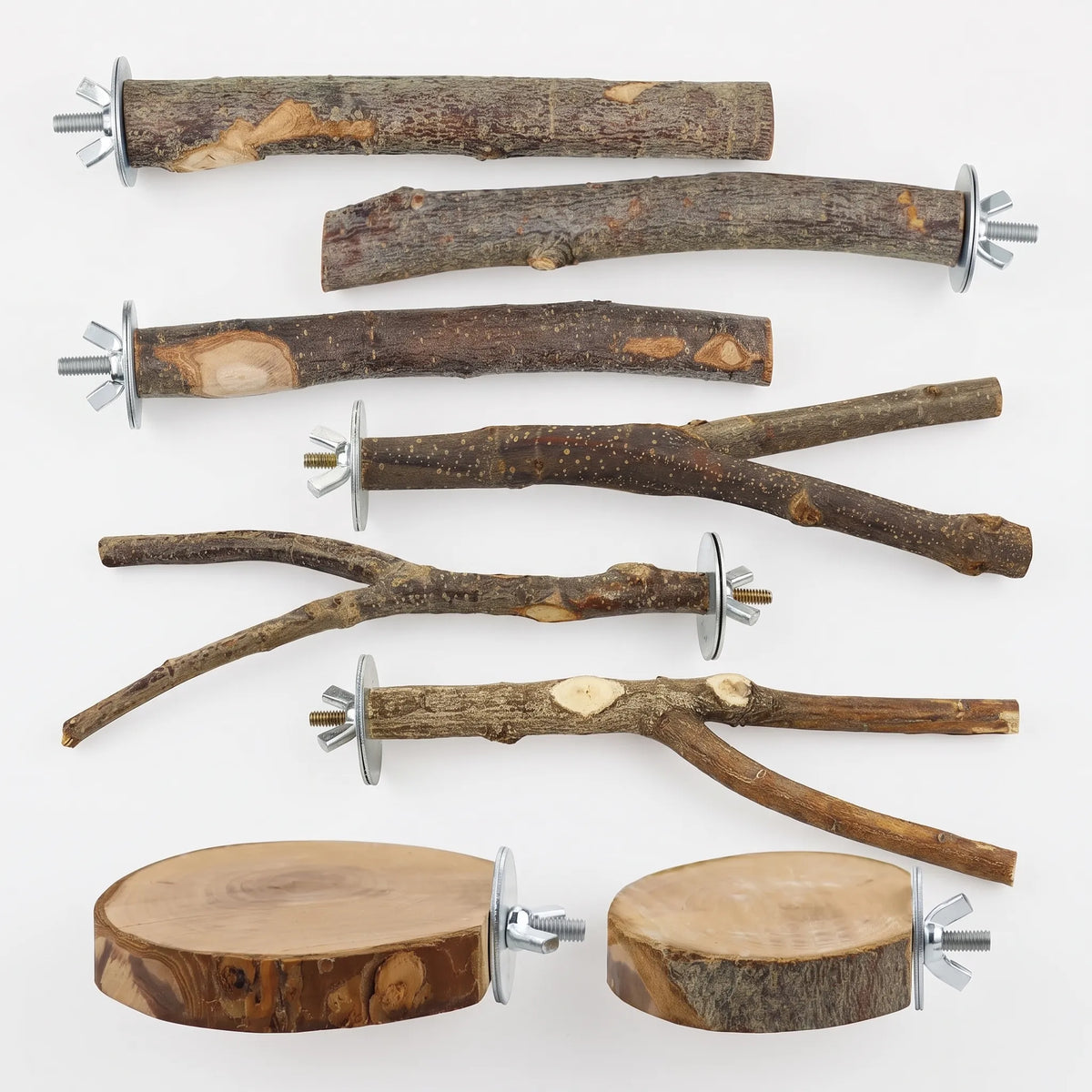 Flat lay of all eight natural wood perches: five straight and forked branches and two round wooden platforms, each with a wing nut and washer. 1
