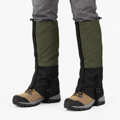 Olive green and black gaiters worn over hiking boots, with black zip edging and an adjustable strap under the sole. 10