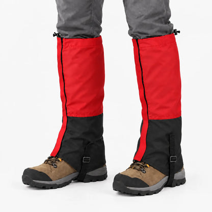 Red and black gaiters worn over tan hiking boots against a white background, with drawcord toggles at the top. 11
