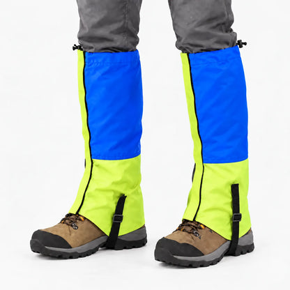 Blue and lime green gaiters worn over hiking boots, with a black zip down the side and a buckled boot strap. 9