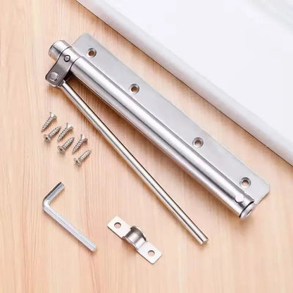 Silver closer laid flat on a wooden surface with its screws, Allen key and door bracket 6