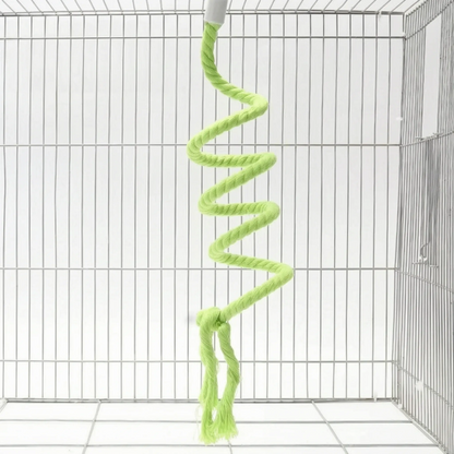 Green version of the spiral rope perch hanging in a white wire cage, with a knot and two frayed tails. 5