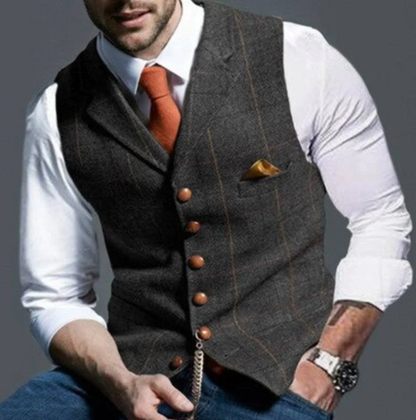 Model wearing the waistcoat in charcoal grey tweed with thin tan window-pane stripes 8