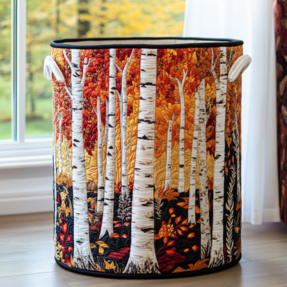 Round quilted basket with black trim and white handles, printed with white birch trees and red, orange and yellow autumn leaves. 3