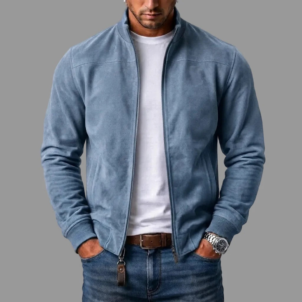 Light blue zip-up jacket worn open over a white T-shirt and jeans, with ribbed cuffs and a leather zip pull. 4