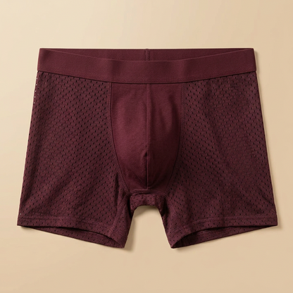 Burgundy boxer shorts laid flat, showing perforated mesh side panels and a smooth centre front panel 6