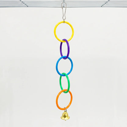 Full five-ring chain in yellow, purple, blue, green and orange, with a gold bell, hanging from a wire cage roof against a pale background. 6