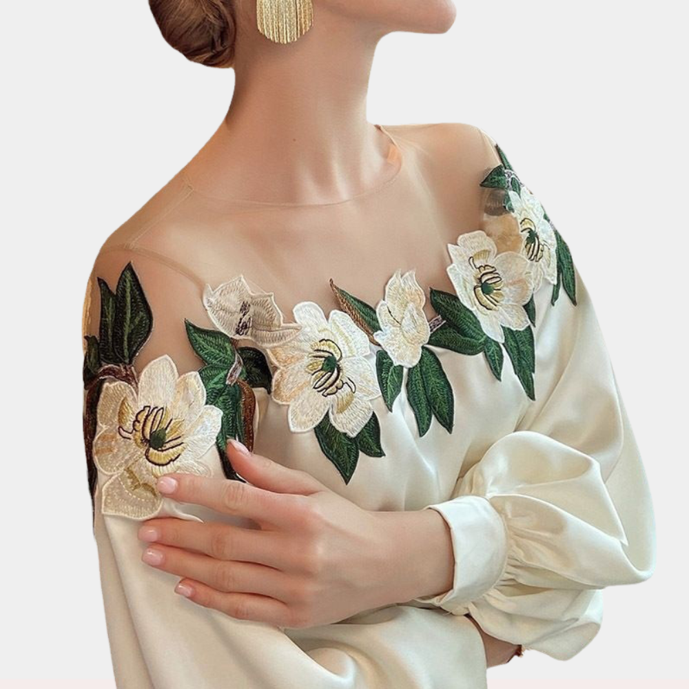 Beige women's blouse with autumnal floral print and a relaxed fit – Elvira