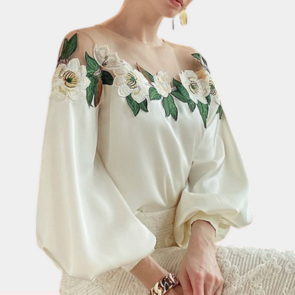 Beige women's blouse with autumnal floral print and a relaxed fit – Elvira