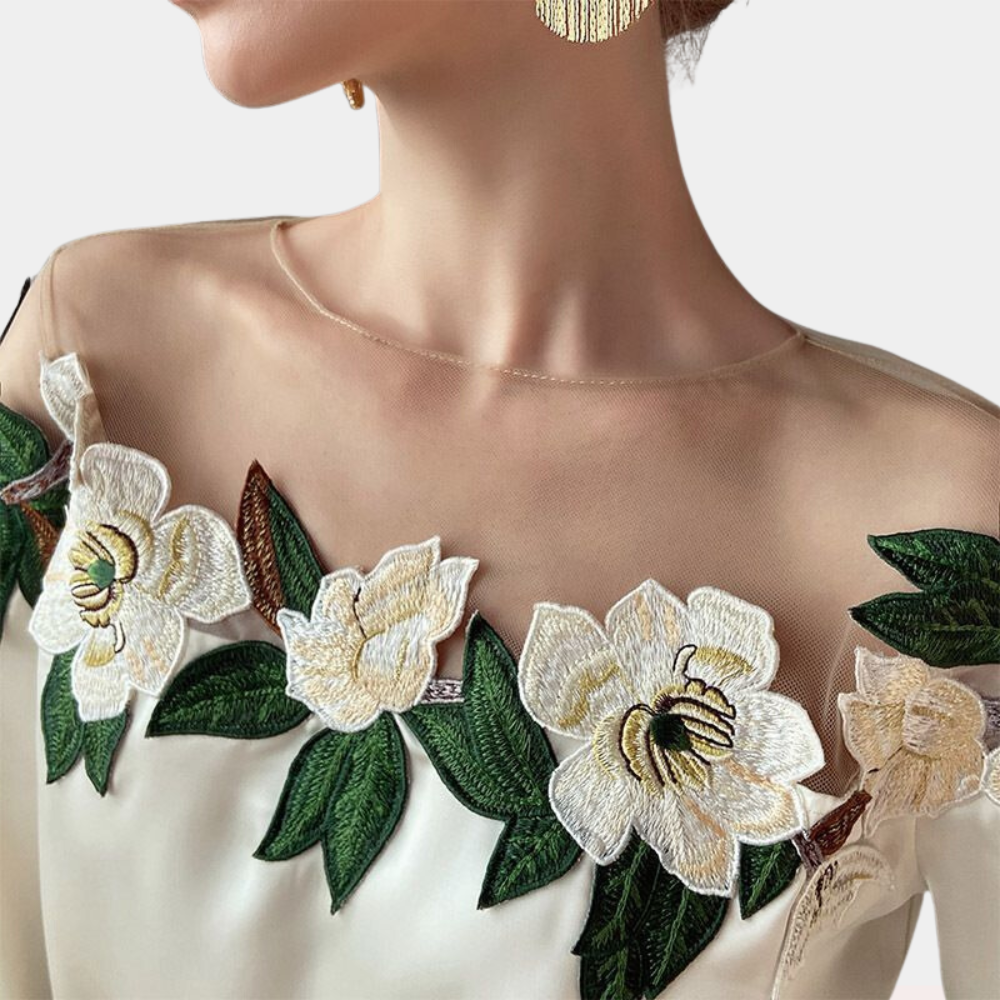 Beige women's blouse with autumnal floral print and a relaxed fit – Elvira