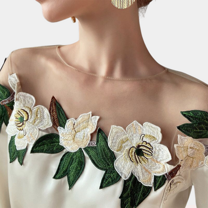 Beige women's blouse with autumnal floral print and a relaxed fit – Elvira