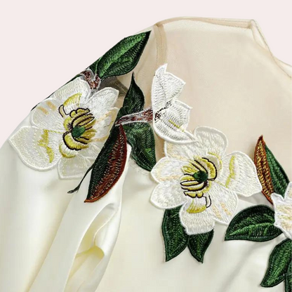 Beige women's blouse with autumnal floral print and a relaxed fit – Elvira