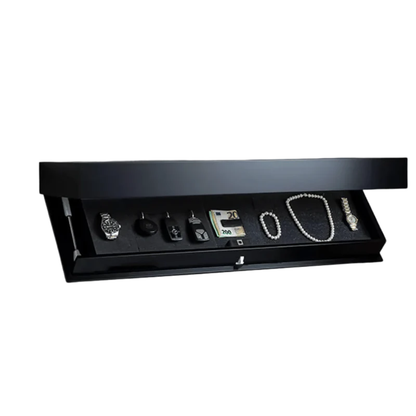 Black floating shelf with its front flap tilted open, showing a foam-lined compartment holding watches, car keys, banknotes and pearl jewellery. 1
