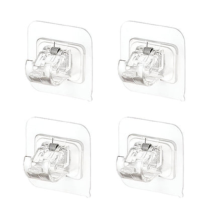 Four clear square adhesive rod clips with visible metal springs, arranged in a grid on a white background. 3
