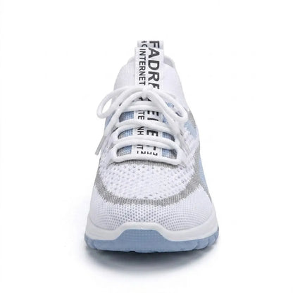 Front view of a white and pale blue mesh trainer showing the laces, tongue pull tab and rounded toe. 8
