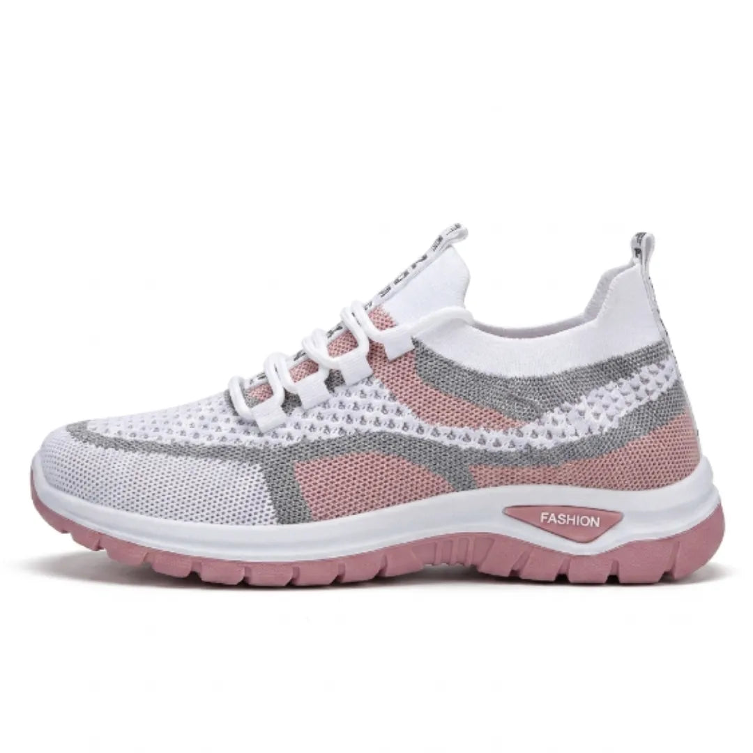 Side view of the white mesh trainer in dusky pink with grey stripes and a matching pink chunky sole. 19