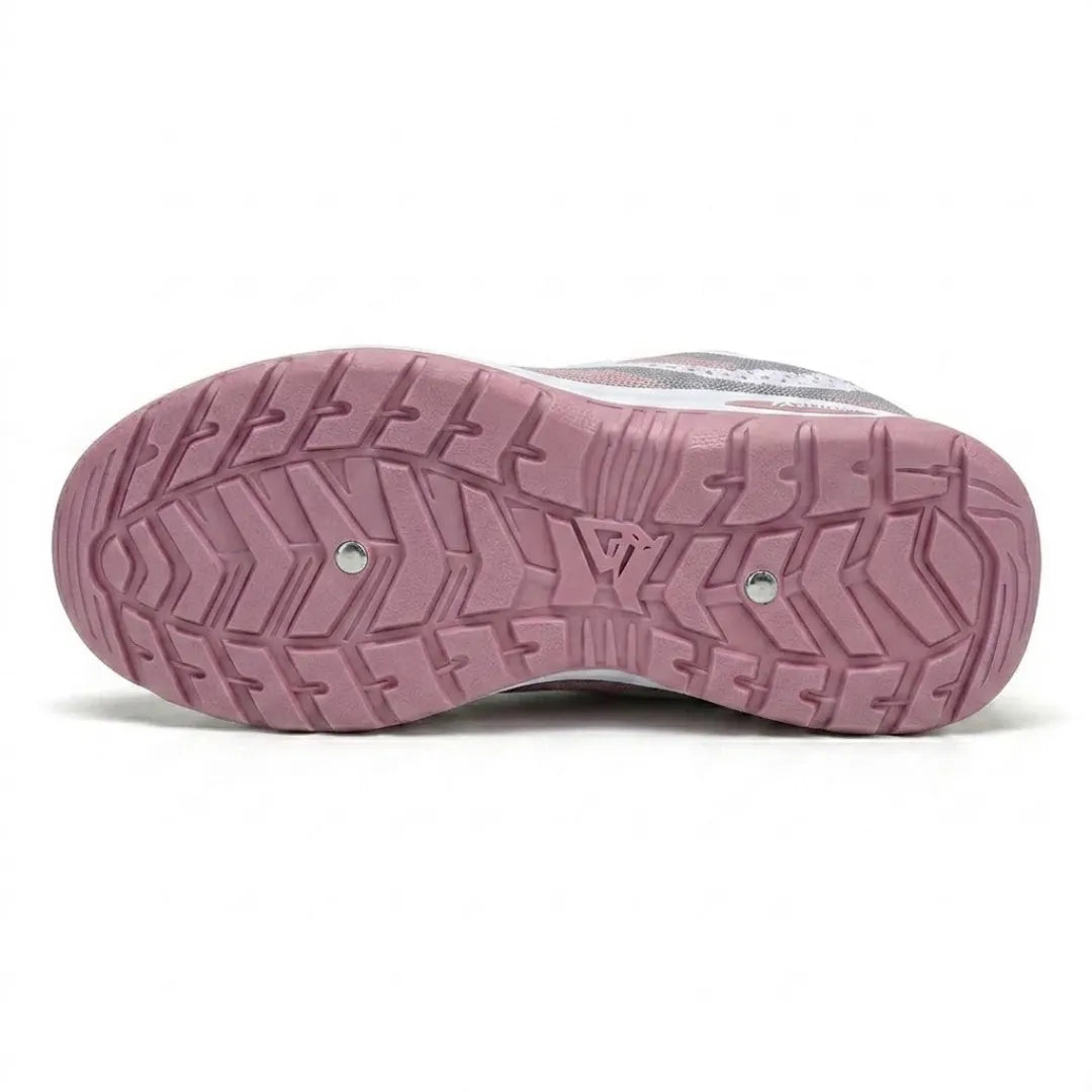 Underside of a pink trainer showing the chunky tread pattern of the non-slip sole. 27