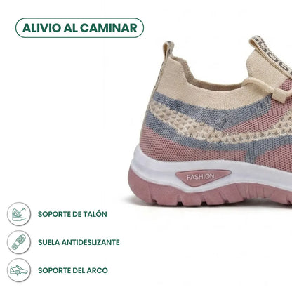 Close-up of the heel of a beige, pink and grey mesh trainer with heel-support icons. 31