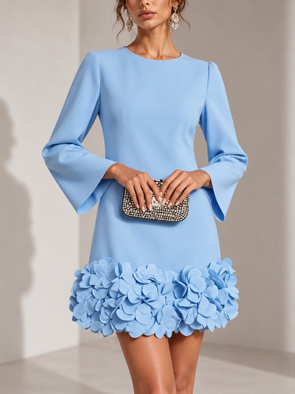 Light blue version of the dress, close front view, with flared sleeves and a hem of 3D petals. 5
