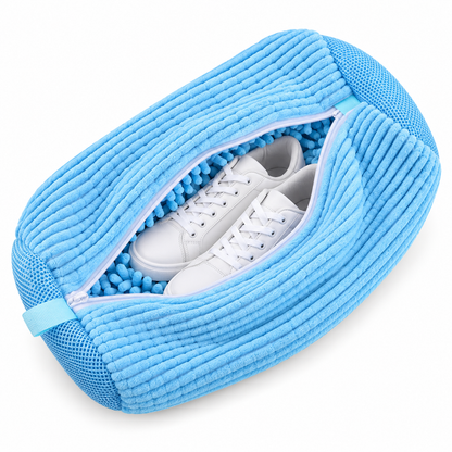 Light blue ribbed plush shoe washing bag with mesh ends, partly unzipped to show white trainers 11