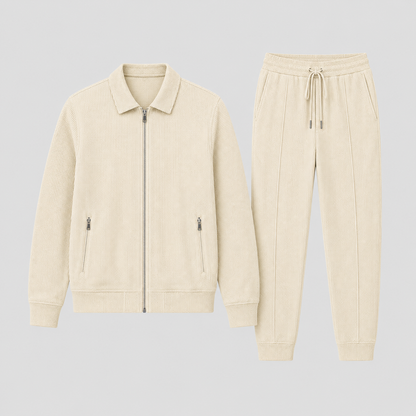 Flat lay of the cream zip jacket and cuffed drawstring trousers side by side 6
