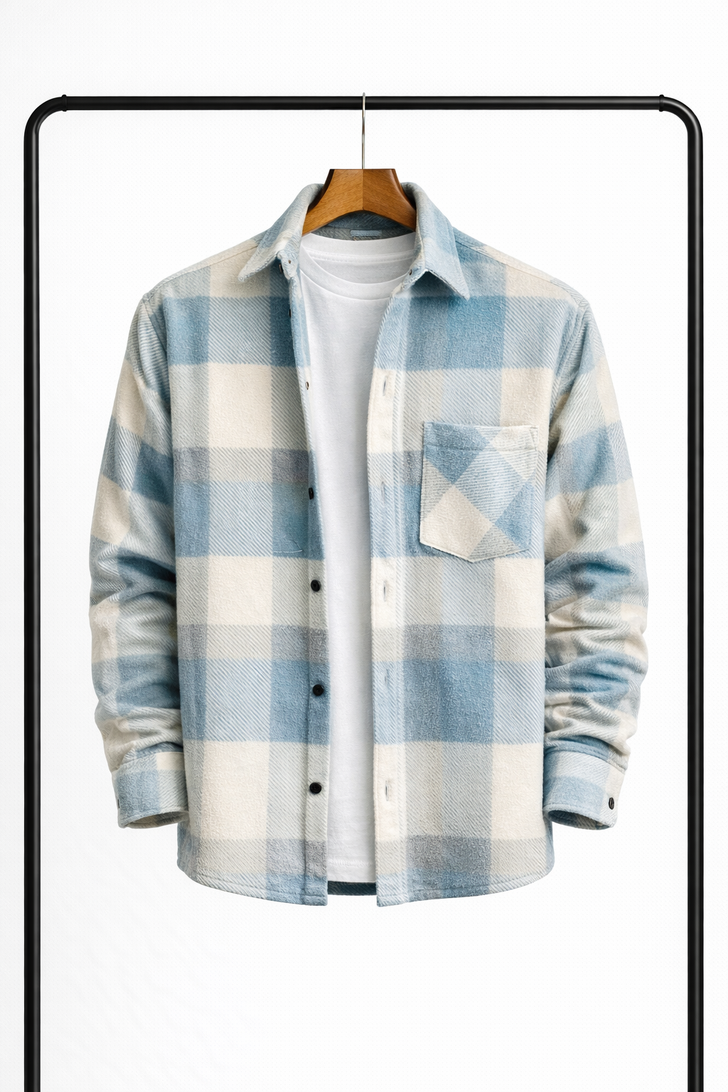 Front view of the overshirt in pale blue and cream check, hanging open over a white tee, with chest pocket. 1