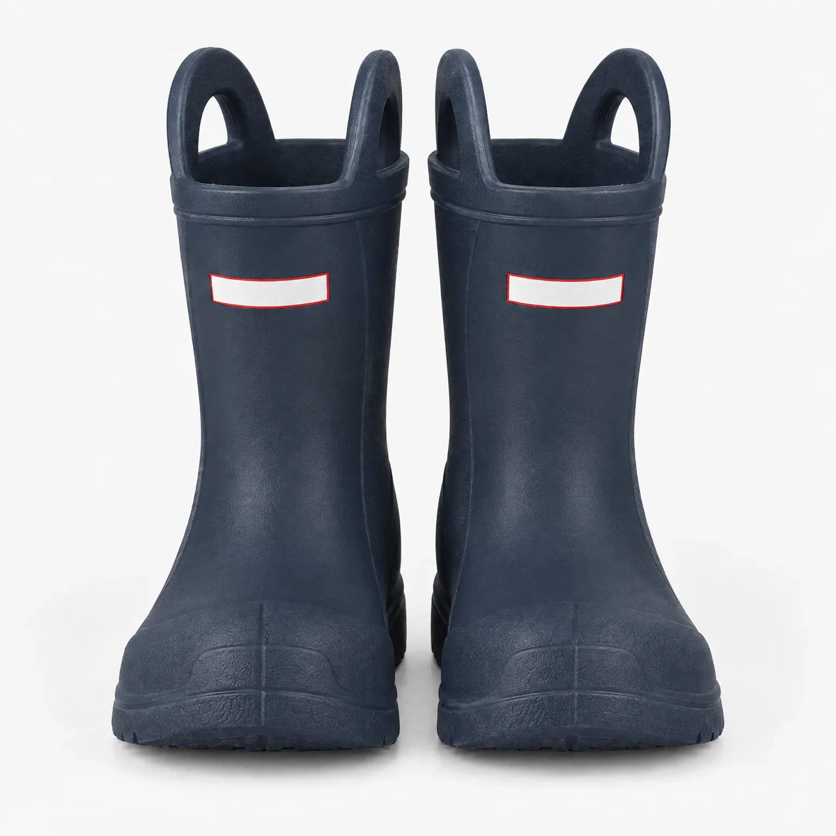 Second front view of the navy blue wellies, showing both handles, blank white tabs and the textured toe caps. 10
