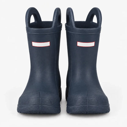 Second front view of the navy blue wellies, showing both handles, blank white tabs and the textured toe caps. 10