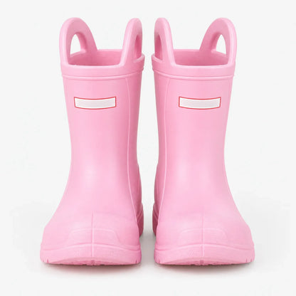 Front view of a pair of pink wellies with two pull-on handles and a blank white tab on each boot. 2
