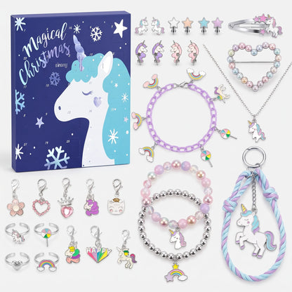 Blue unicorn-design advent calendar box with pastel and silver-toned jewellery pieces arranged around it 4
