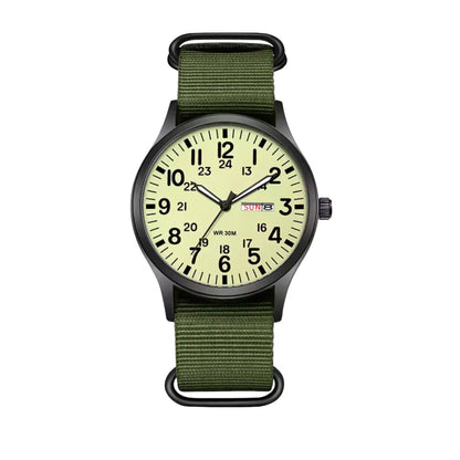 Front view of the version with a pale luminous green dial, black numerals and an olive green woven strap. 5