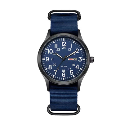 Front view of the version with a navy blue dial, white numerals and a matching navy blue woven strap. 6