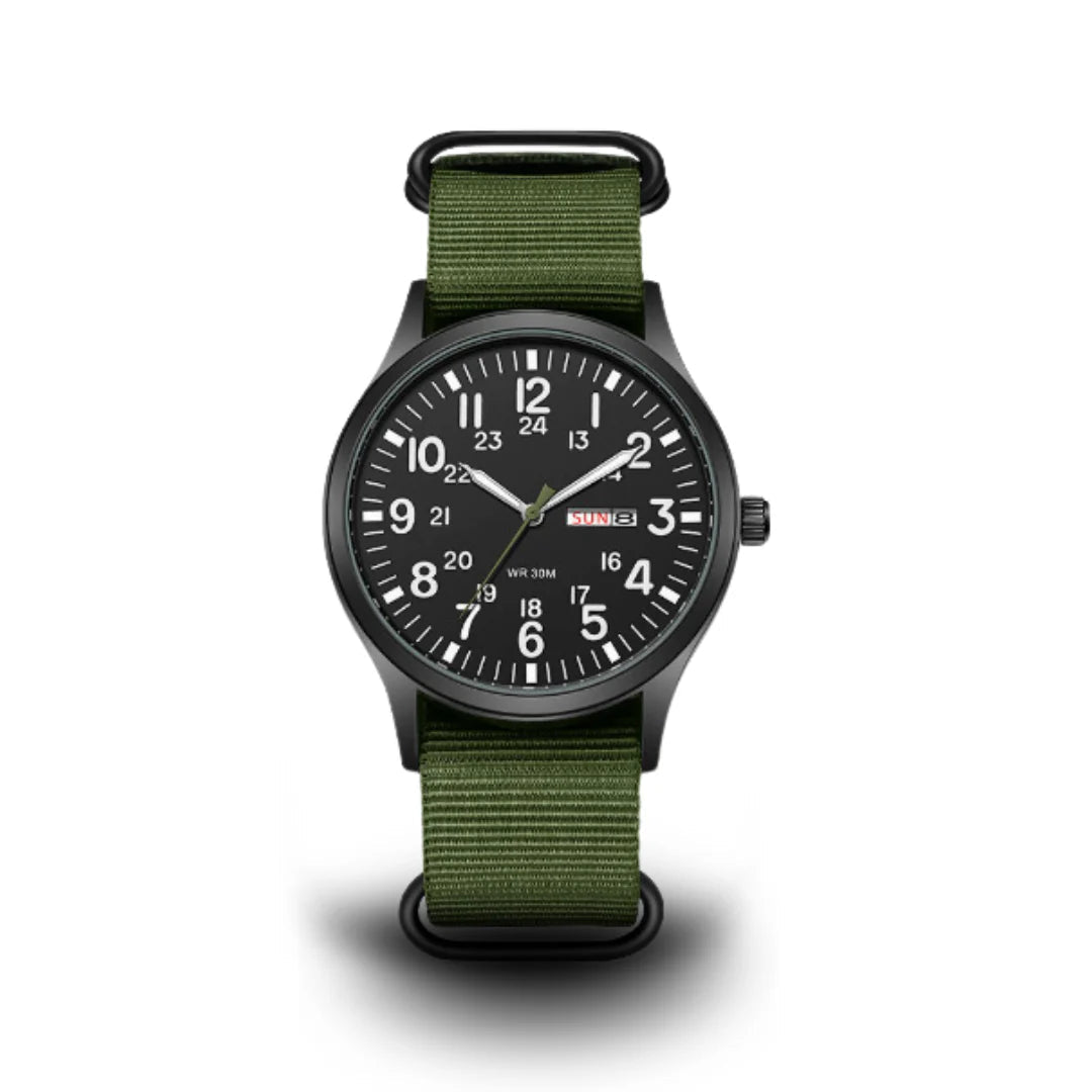 Front view of the field watch with a black dial, 24-hour inner numerals and an olive green woven strap on a white background. 1