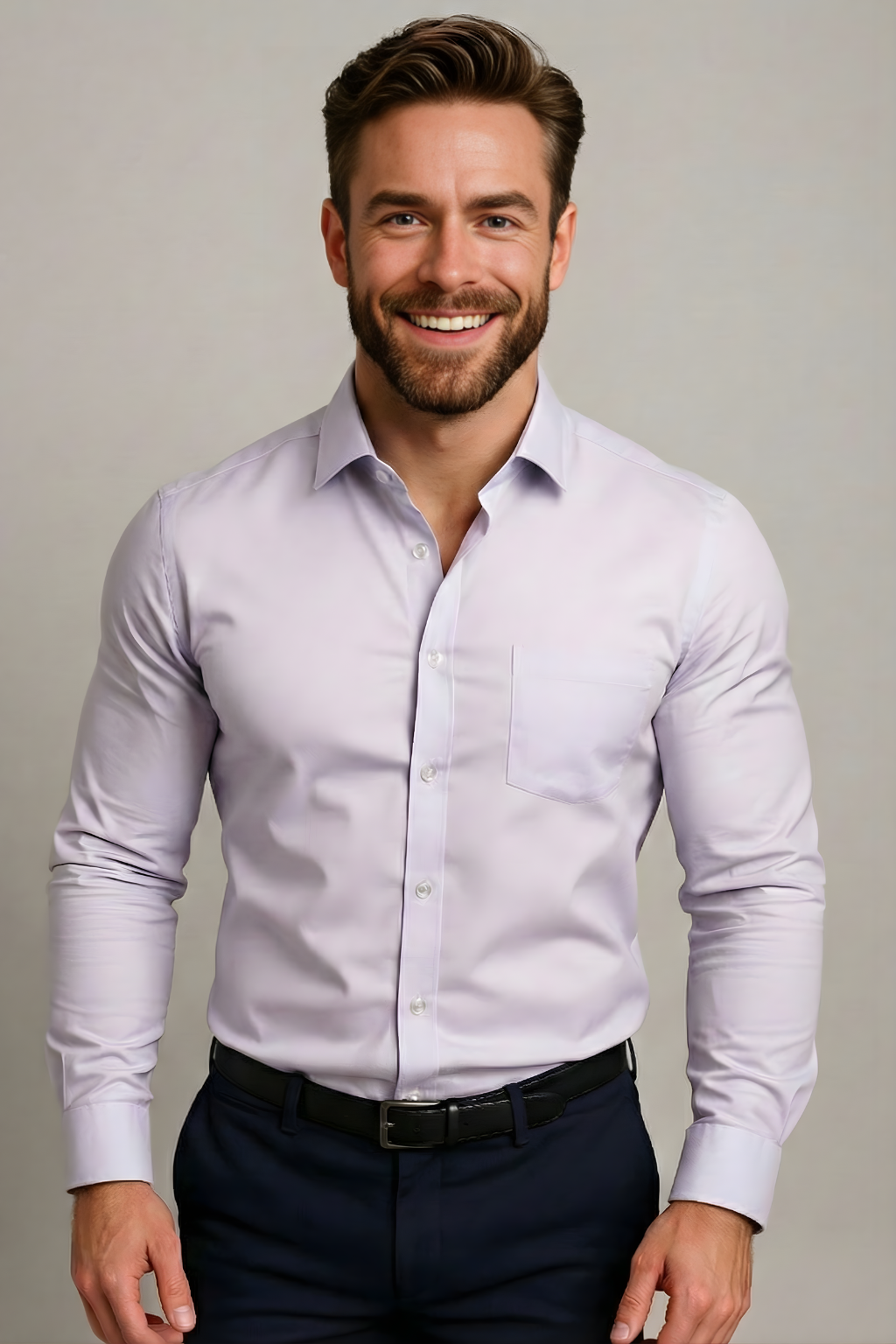 Model wears the pale lilac shirt with chest pocket and clear buttons, with a black belt and navy trousers 7