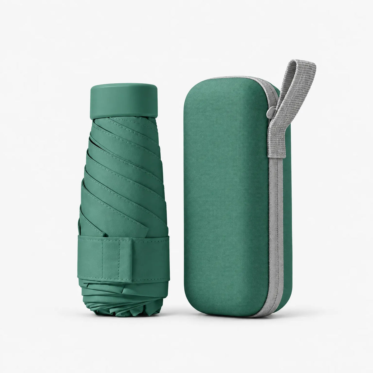 Folded dark green umbrella with a Velcro strap beside its matching green hard case with a grey zip and carry loop. 14