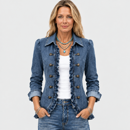 Woman facing the camera in the blue denim jacket, hands in pockets, with turquoise necklaces 2