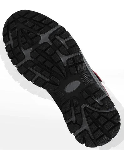 Underside of the boot showing the deep black rubber tread pattern with grey accents 3