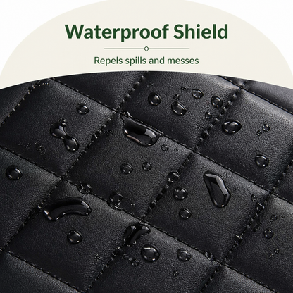 Close-up of the black quilted faux leather surface with water droplets beading on top, showing its waterproof finish. 3