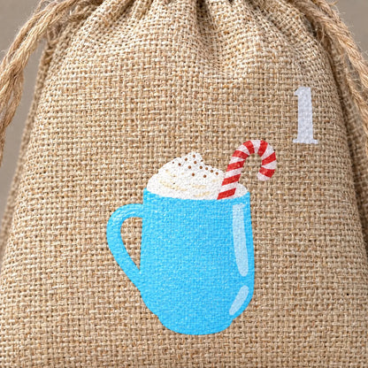 Close-up of the woven natural fabric of one bag, showing a printed blue mug of cream topped with a candy cane, and the thick drawstring. 3