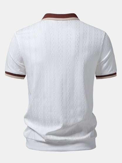 Back view of the white polo showing the all-over textured knit, contrast collar edge and ribbed hem. 6