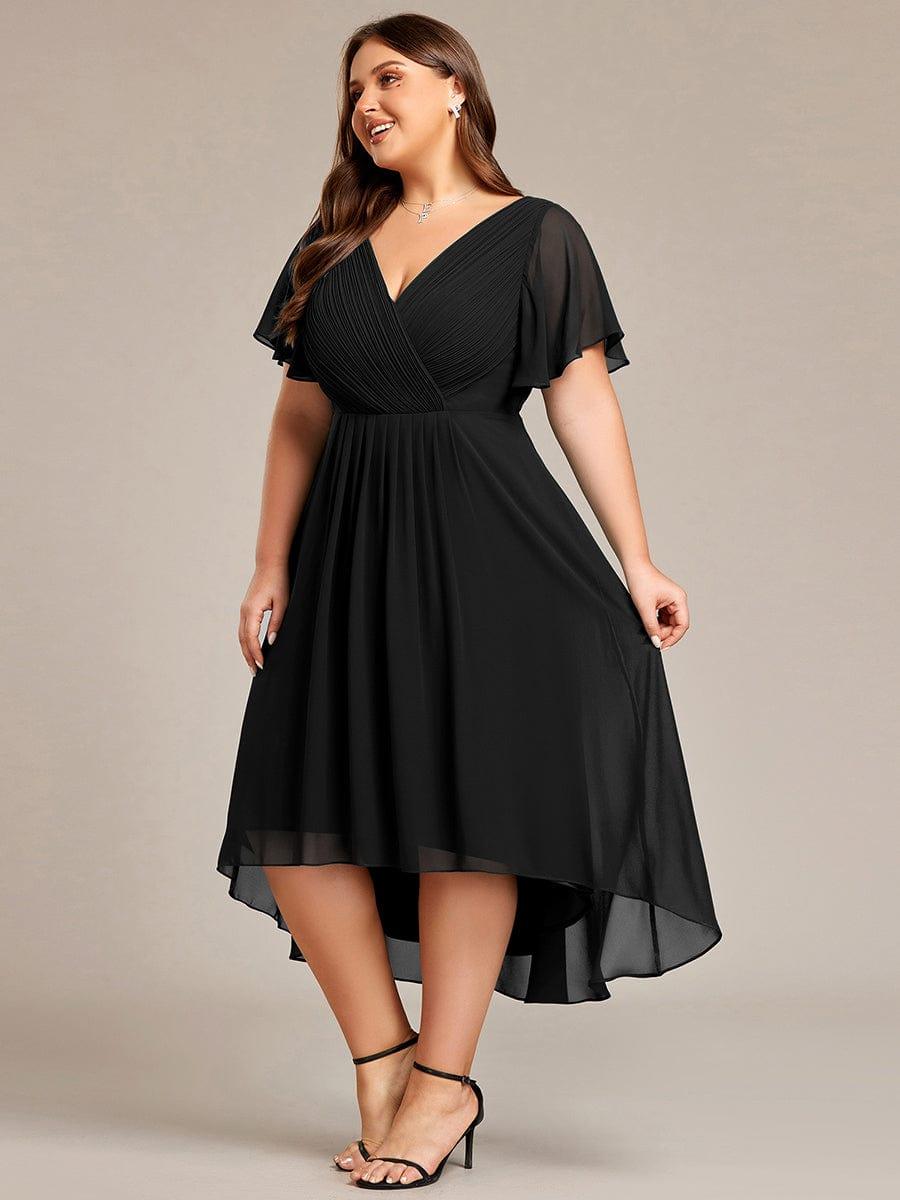 Side view of the black dress on a plus-size model, showing the layered high-low chiffon hem. 29