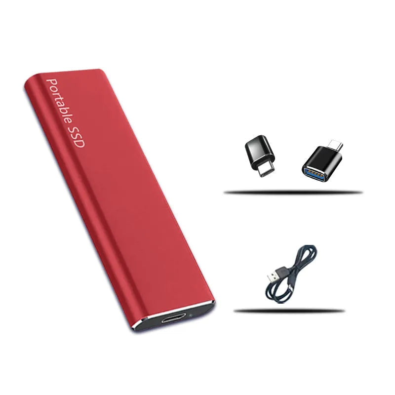 Red version of the slim drive laid out with two small black USB adapters and a coiled black connecting cable. 4